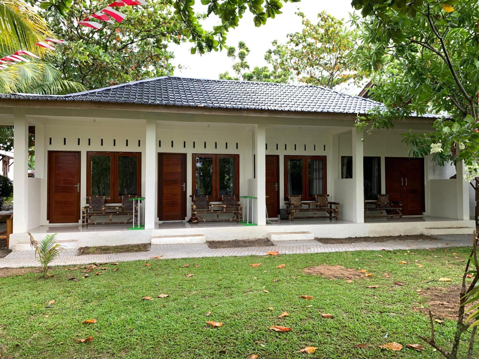 Gino'S Place - Guest House & Jungle Trekking Bukit Lawang Esterno foto